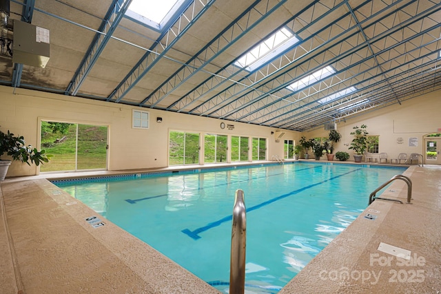 609 Carriage Commons Dr, Hendersonville, NC 28791 - indoor community pool featuring a skylight