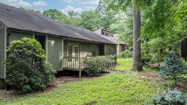 1748 4th Street Ct NE, Hickory, NC 28601 - view of home's exterior featuring a yard, roof with shingles, french doors, and board and batten siding