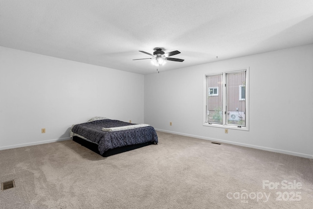 1748 4th Street Ct NE, Hickory, NC 28601 - bedroom with carpet and a ceiling fan