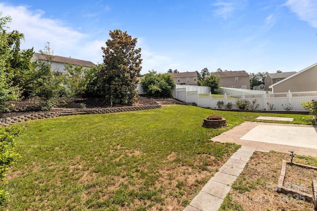 1901 Summit Ridge Ln, Kannapolis, NC 28083 - view of yard featuring an outdoor fire pit, a patio, and a residential view