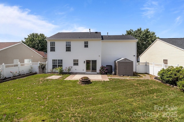 1901 Summit Ridge Ln, Kannapolis, NC 28083 - rear view of house featuring a patio area, an outdoor fire pit, a storage unit, and a fenced backyard