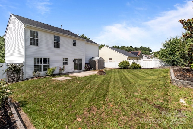 1901 Summit Ridge Ln, Kannapolis, NC 28083 - rear view of house featuring a fire pit, a patio, and a fenced backyard