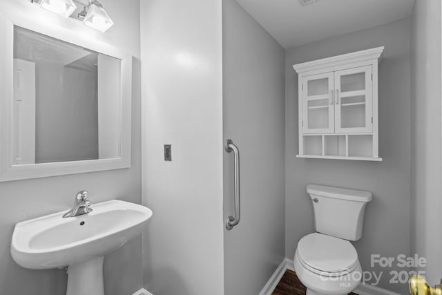 1901 Summit Ridge Ln, Kannapolis, NC 28083 - half bath featuring toilet and a sink
