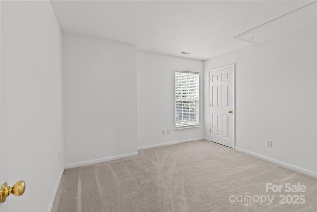 1901 Summit Ridge Ln, Kannapolis, NC 28083 - spare room featuring attic access and carpet flooring