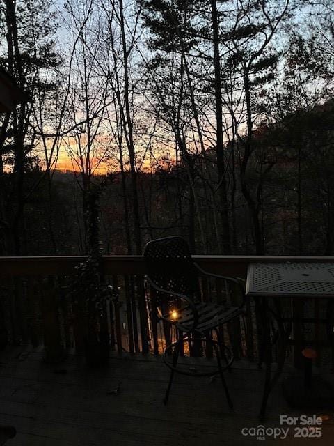 26B Cedarwood Trl, Asheville, NC 28806 - patio terrace at dusk with a wooden deck