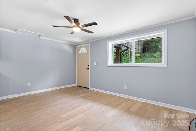 1175 Bamboo Rd, Boone, NC 28607 - empty room with ornamental molding, a ceiling fan, and light wood finished floors