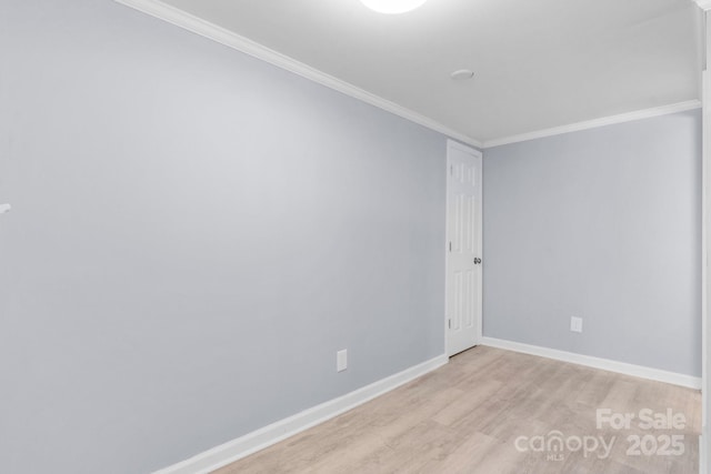 1175 Bamboo Rd, Boone, NC 28607 - spare room featuring light wood finished floors and ornamental molding