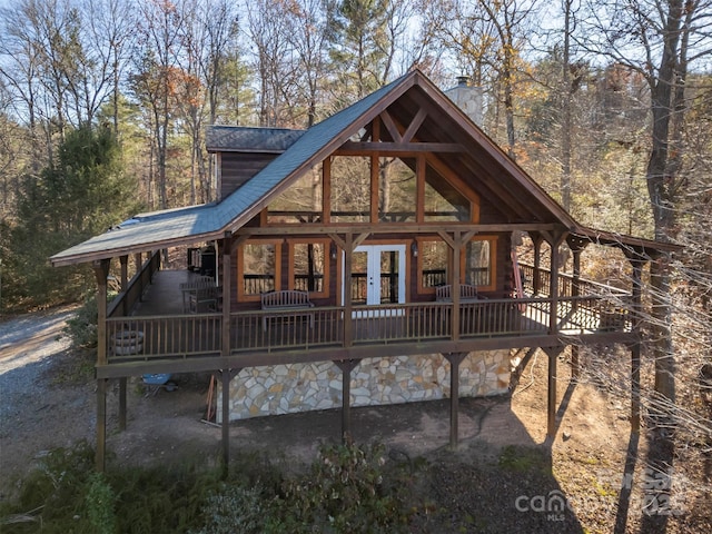 197 First Broad Dr, Bostic, NC 28018 - view of front facade with a chimney, french doors, and a deck