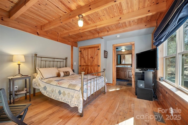 197 First Broad Dr, Bostic, NC 28018 - bedroom featuring a wood ceiling with exposed beams, light wood-style flooring, and connected bathroom