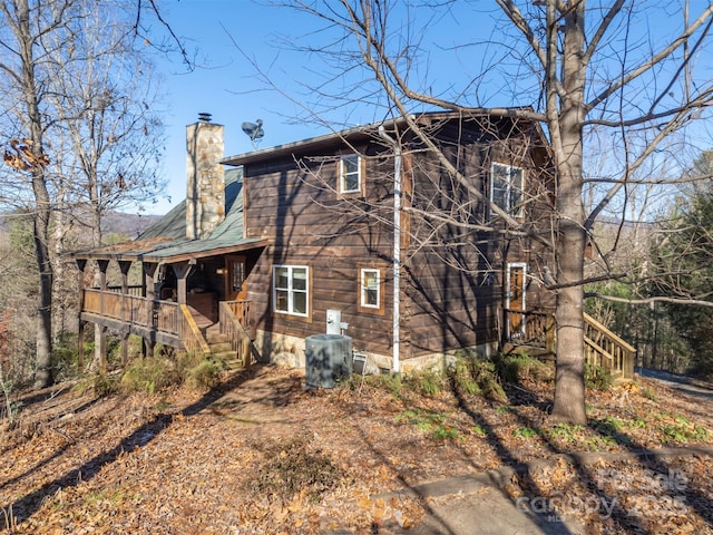 197 First Broad Dr, Bostic, NC 28018 - rear view of property with a chimney