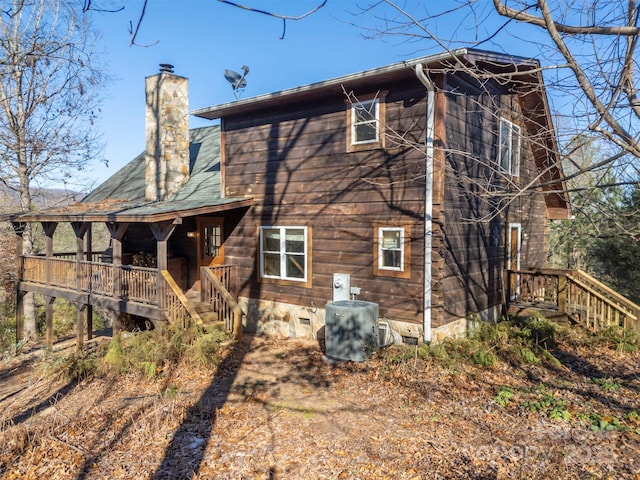 197 First Broad Dr, Bostic, NC 28018 - back of property with a chimney and stairway