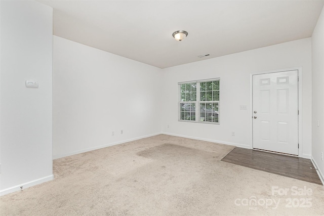 1404 Waylon Ave, Gastonia, NC 28054 - carpeted spare room featuring baseboards