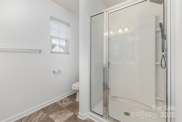 1404 Waylon Ave, Gastonia, NC 28054 - bathroom featuring a stall shower and baseboards