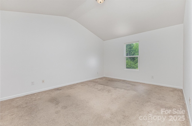 1404 Waylon Ave, Gastonia, NC 28054 - empty room with vaulted ceiling and carpet