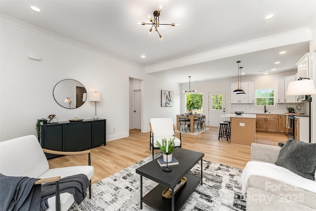 3486 Winters St, Newton, NC 28658 - living room with ornamental molding, light wood-type flooring, recessed lighting, and a chandelier