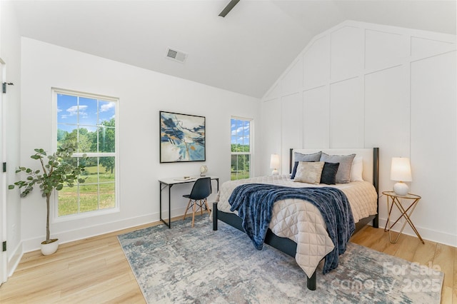 3486 Winters St, Newton, NC 28658 - bedroom with light wood-type flooring, vaulted ceiling, and a ceiling fan