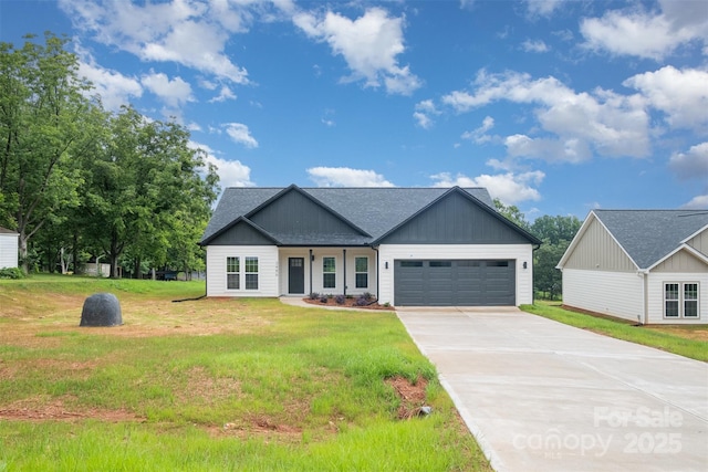 3486 Winters St, Newton, NC 28658 - view of front facade with driveway, a garage, a front yard, and a shingled roof