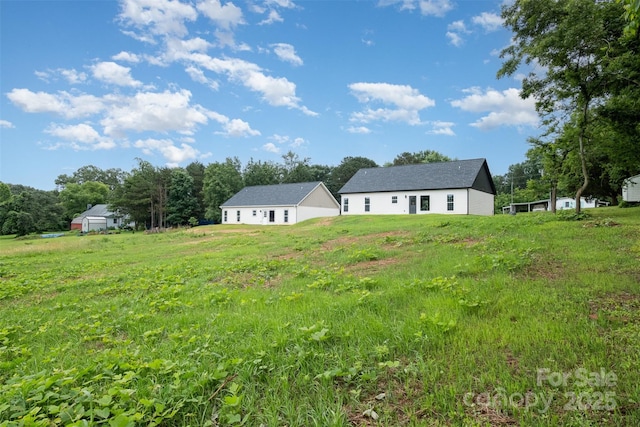 3486 Winters St, Newton, NC 28658 - view of green lawn featuring a garage