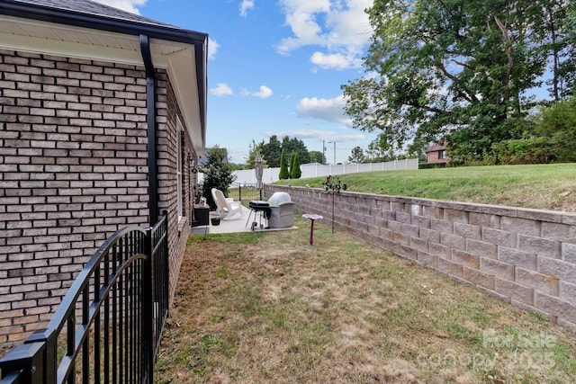 203 Poplins Grove Church Rd, Albemarle, NC 28001 - fenced backyard featuring a patio