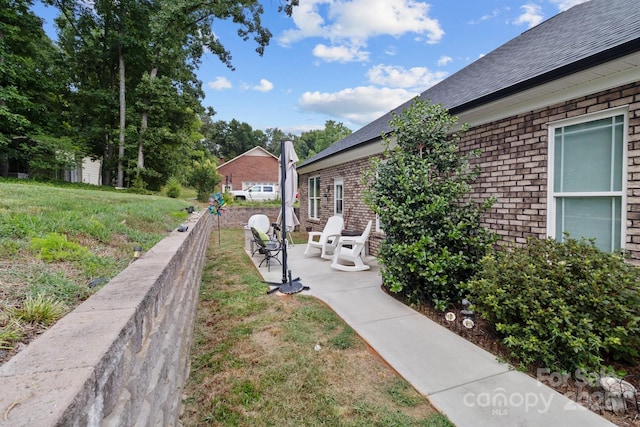 203 Poplins Grove Church Rd, Albemarle, NC 28001 - view of green lawn featuring a patio