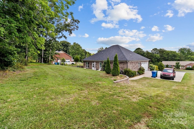 203 Poplins Grove Church Rd, Albemarle, NC 28001 - view of property exterior featuring a yard, concrete driveway, and an attached garage