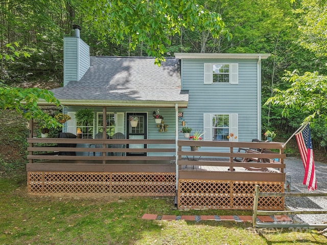 84 Hawk Nest Rd, Maggie Valley, NC 28751 - back of house with a chimney, a shingled roof, and a deck