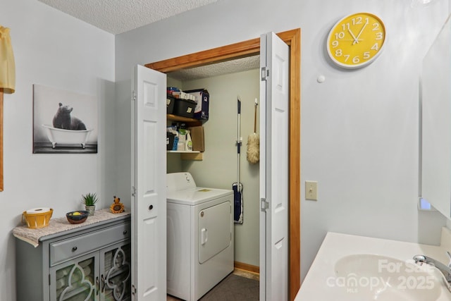84 Hawk Nest Rd, Maggie Valley, NC 28751 - laundry area featuring washer / clothes dryer and a textured ceiling