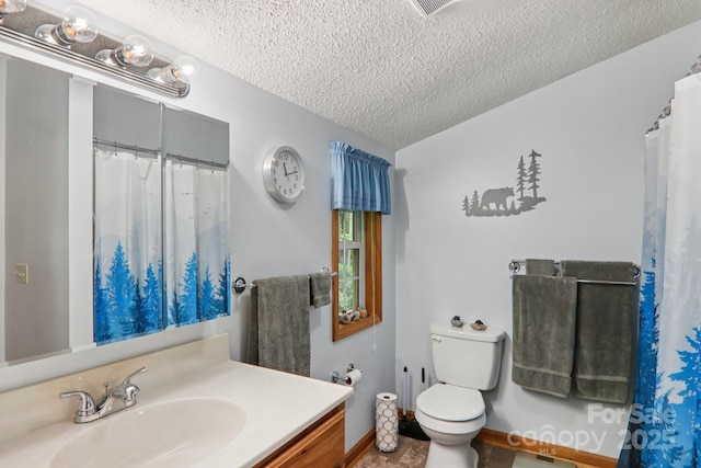84 Hawk Nest Rd, Maggie Valley, NC 28751 - bathroom featuring a textured ceiling and vanity