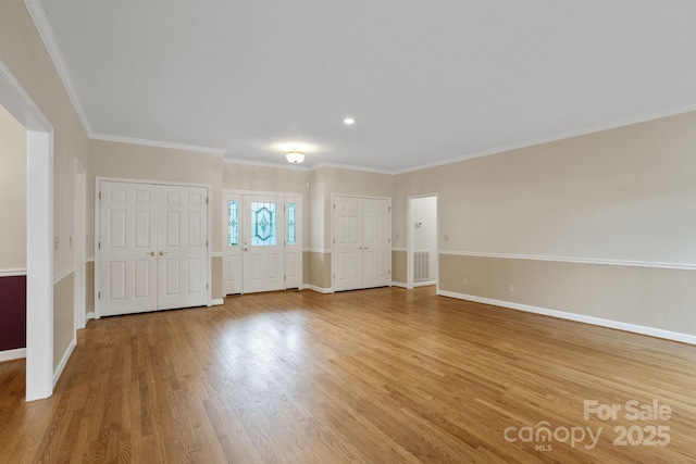 390 Classic Oaks Cir, Hendersonville, NC 28792 - entryway featuring wood finished floors, crown molding, and recessed lighting
