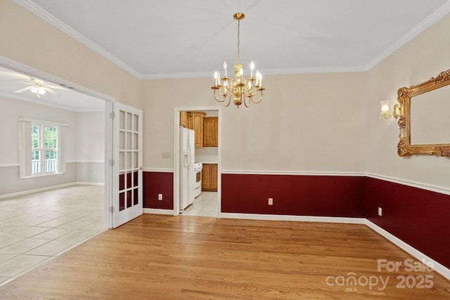 390 Classic Oaks Cir, Hendersonville, NC 28792 - unfurnished dining area with ornamental molding, a chandelier, light wood-style floors, and ceiling fan