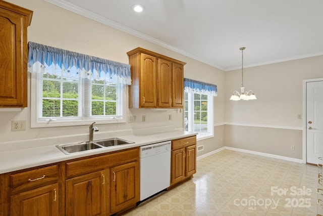 390 Classic Oaks Cir, Hendersonville, NC 28792 - kitchen featuring white dishwasher, healthy amount of natural light, ornamental molding, brown cabinetry, and a chandelier