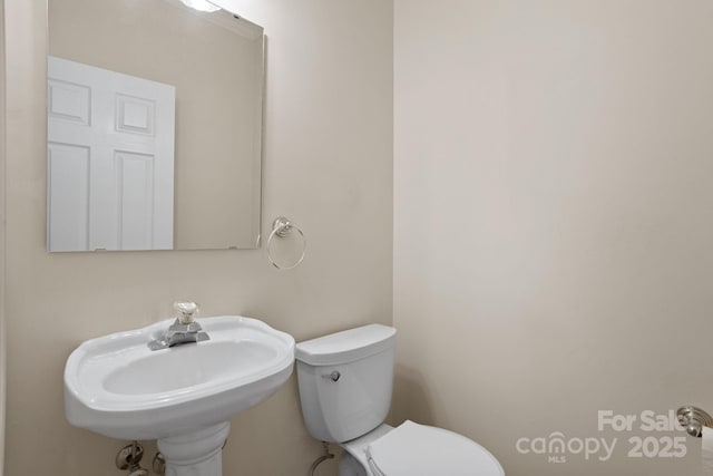 390 Classic Oaks Cir, Hendersonville, NC 28792 - bathroom featuring toilet and a sink