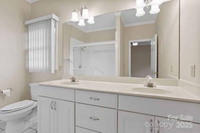 390 Classic Oaks Cir, Hendersonville, NC 28792 - bathroom with a chandelier, double vanity, crown molding, and a shower stall