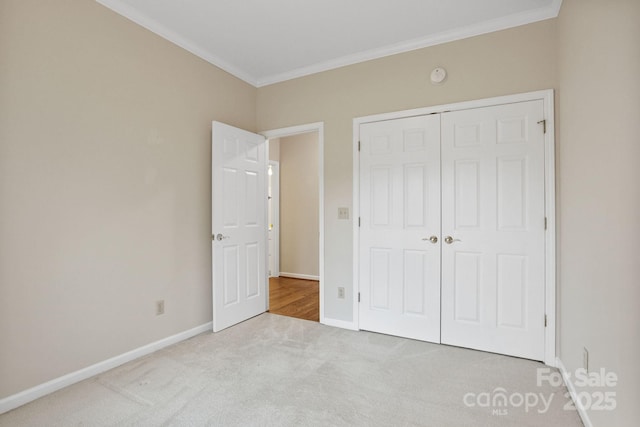 390 Classic Oaks Cir, Hendersonville, NC 28792 - unfurnished bedroom with carpet, ornamental molding, and a closet