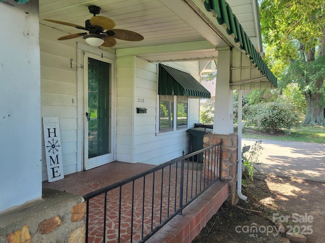 3220 Harmony Hwy, Harmony, NC 28634 - entrance to property with a ceiling fan and a porch