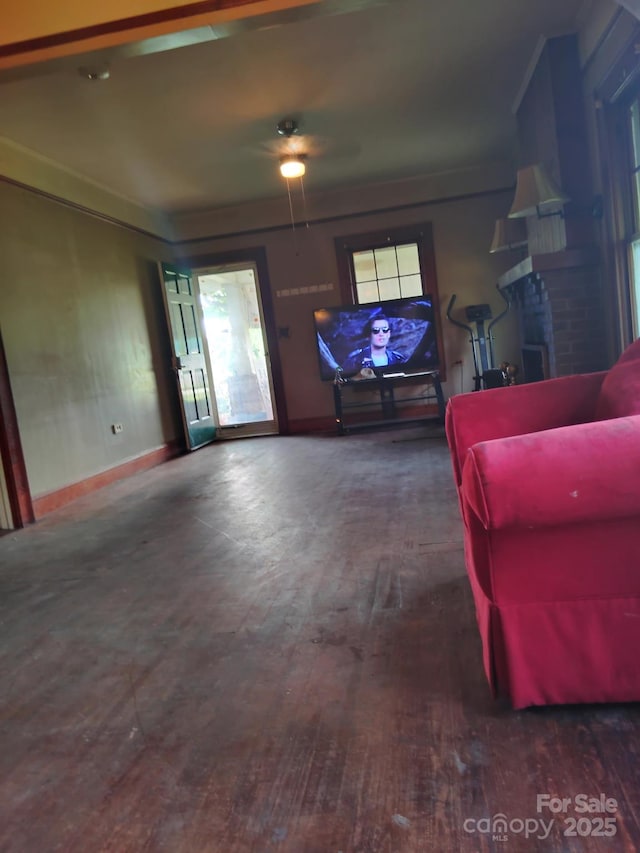 3220 Harmony Hwy, Harmony, NC 28634 - living area with wood finished floors, ceiling fan, and ornamental molding