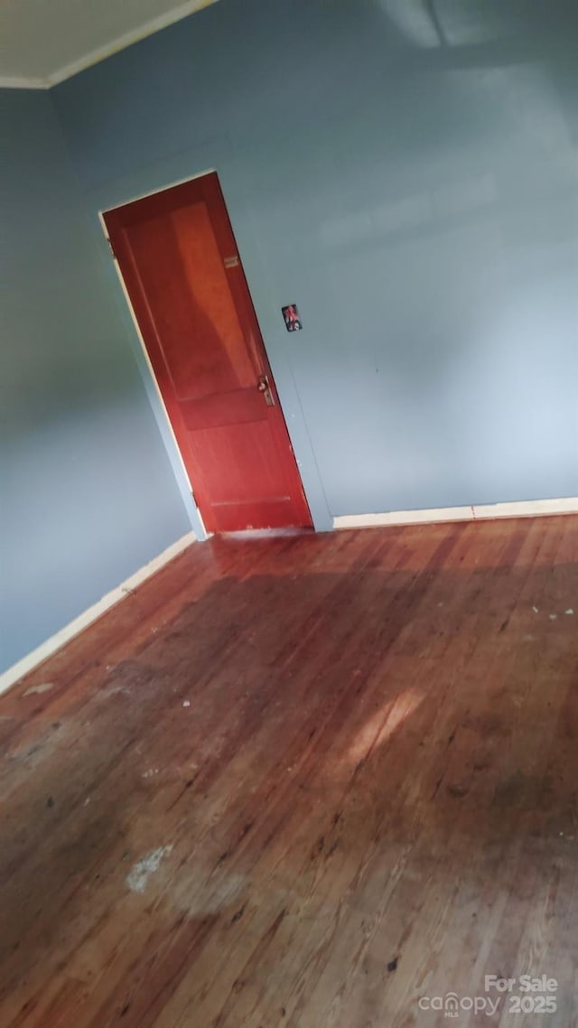 3220 Harmony Hwy, Harmony, NC 28634 - empty room with hardwood / wood-style floors and baseboards