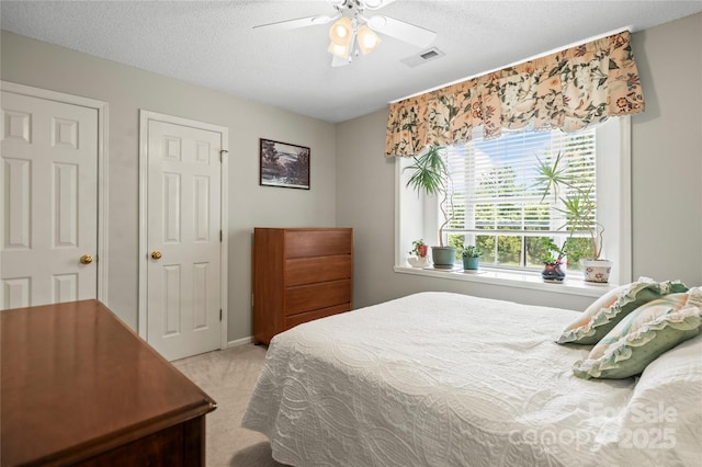 171 Highland Woods Ct, Denver, NC 28037 - bedroom featuring carpet flooring, a textured ceiling, and a ceiling fan
