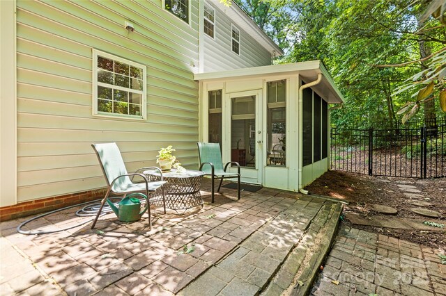 171 Highland Woods Ct, Denver, NC 28037 - view of patio / terrace featuring a sunroom