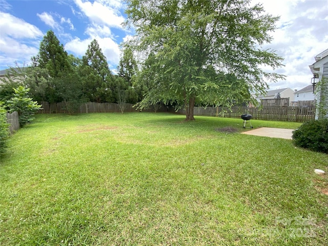 3933 Cameron Creek Dr, Matthews, NC 28105 - fenced backyard featuring a patio area