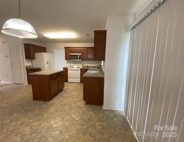 3933 Cameron Creek Dr, Matthews, NC 28105 - kitchen featuring white appliances, a center island, hanging light fixtures, light countertops, and tile patterned floors