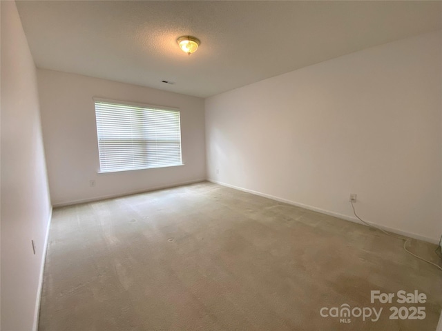 3933 Cameron Creek Dr, Matthews, NC 28105 - carpeted spare room with baseboards
