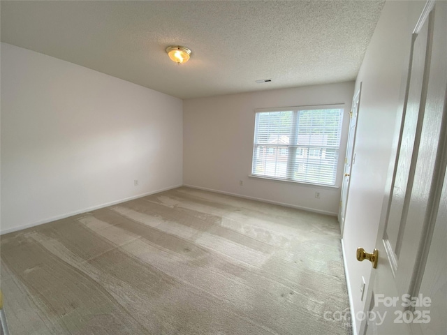 3933 Cameron Creek Dr, Matthews, NC 28105 - unfurnished room with light colored carpet and a textured ceiling