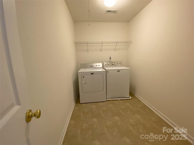 3933 Cameron Creek Dr, Matthews, NC 28105 - laundry area with independent washer and dryer and light tile patterned flooring