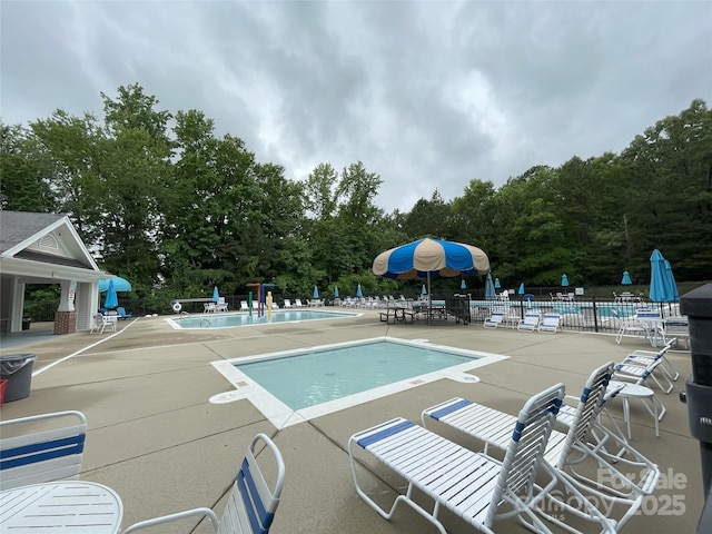 3933 Cameron Creek Dr, Matthews, NC 28105 - community pool featuring a patio