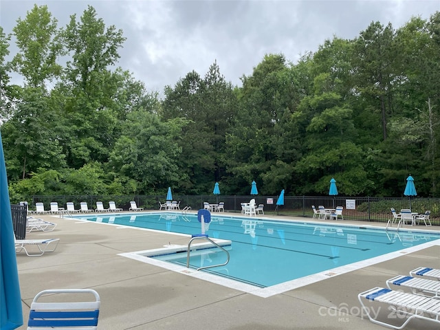 3933 Cameron Creek Dr, Matthews, NC 28105 - community pool featuring a patio area