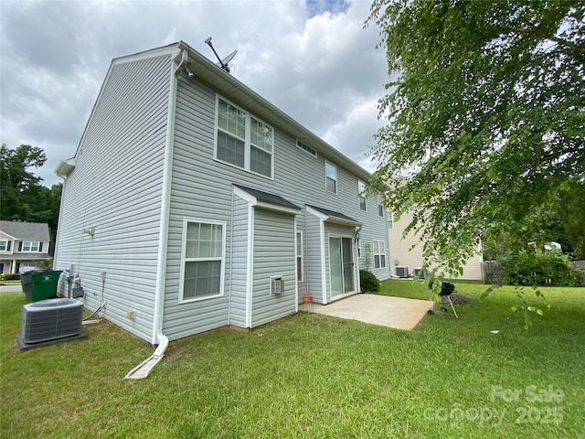 3933 Cameron Creek Dr, Matthews, NC 28105 - back of house with a patio and a lawn