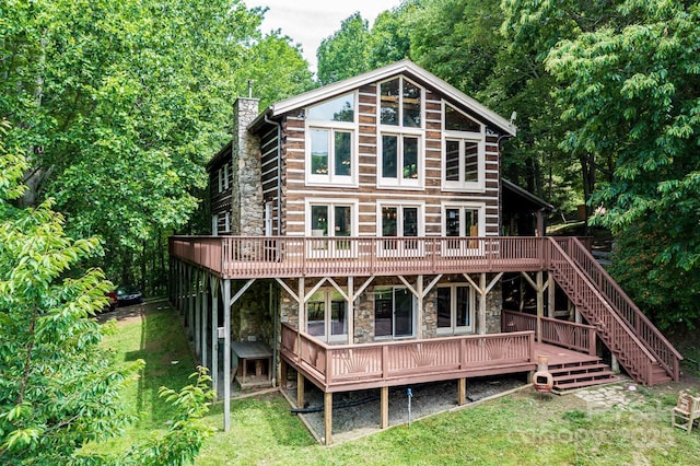 1745 Sugar Camp Rd, Marshall, NC 28753 - rear view of property featuring stone siding, a deck, a yard, and stairs
