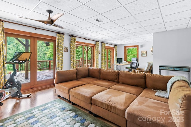 1745 Sugar Camp Rd, Marshall, NC 28753 - living room featuring wood finished floors, a paneled ceiling, and a ceiling fan
