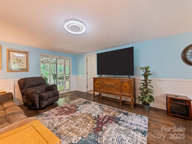 449 Little E Fork Rd, Canton, NC 28716 - living area featuring a wainscoted wall and wood finished floors